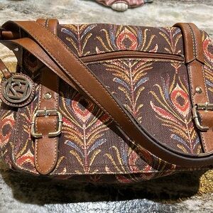 A woman’s Fossil purse